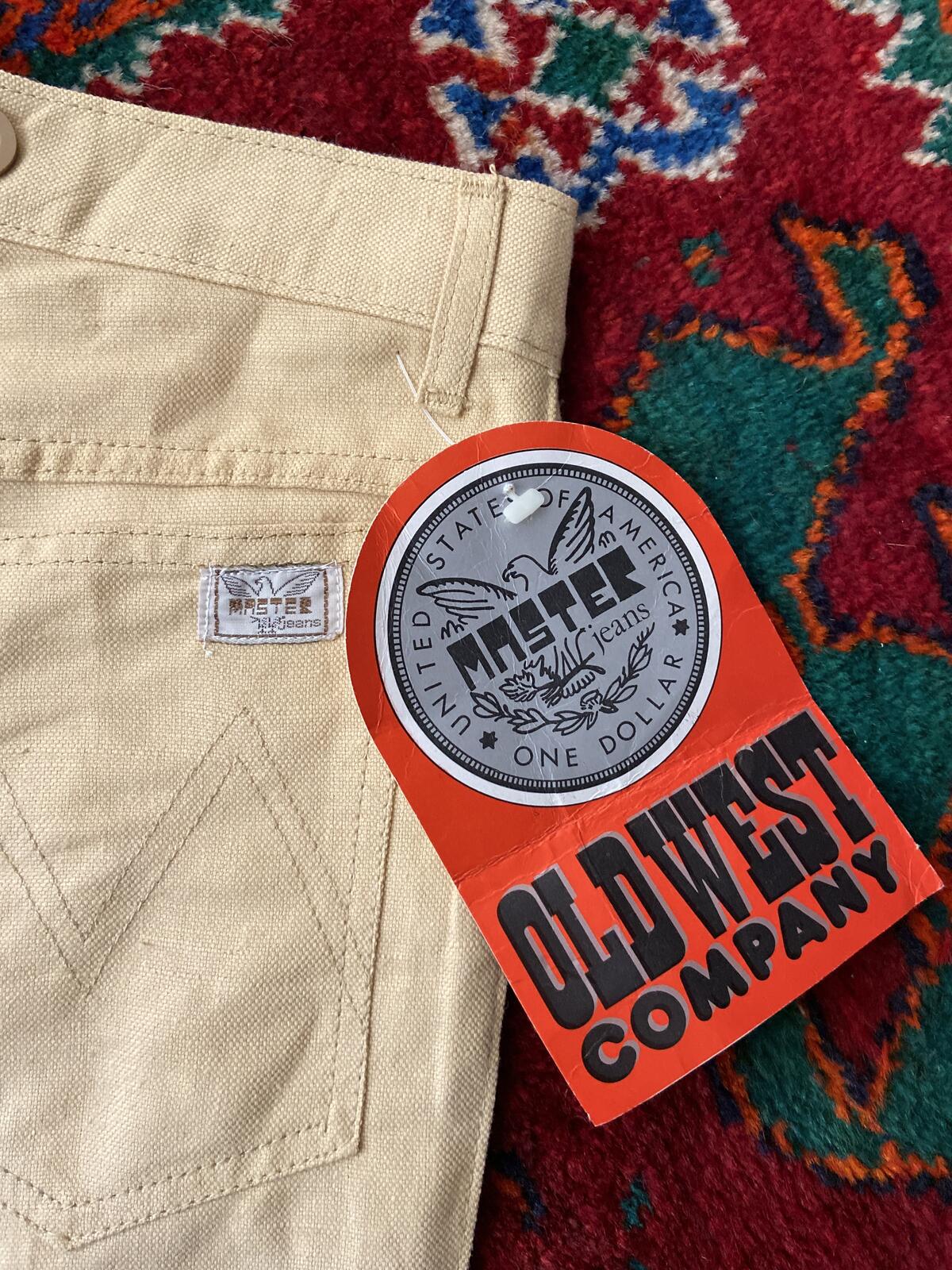 Vintage 1970s Beige Deadstock Flared Jeans W25