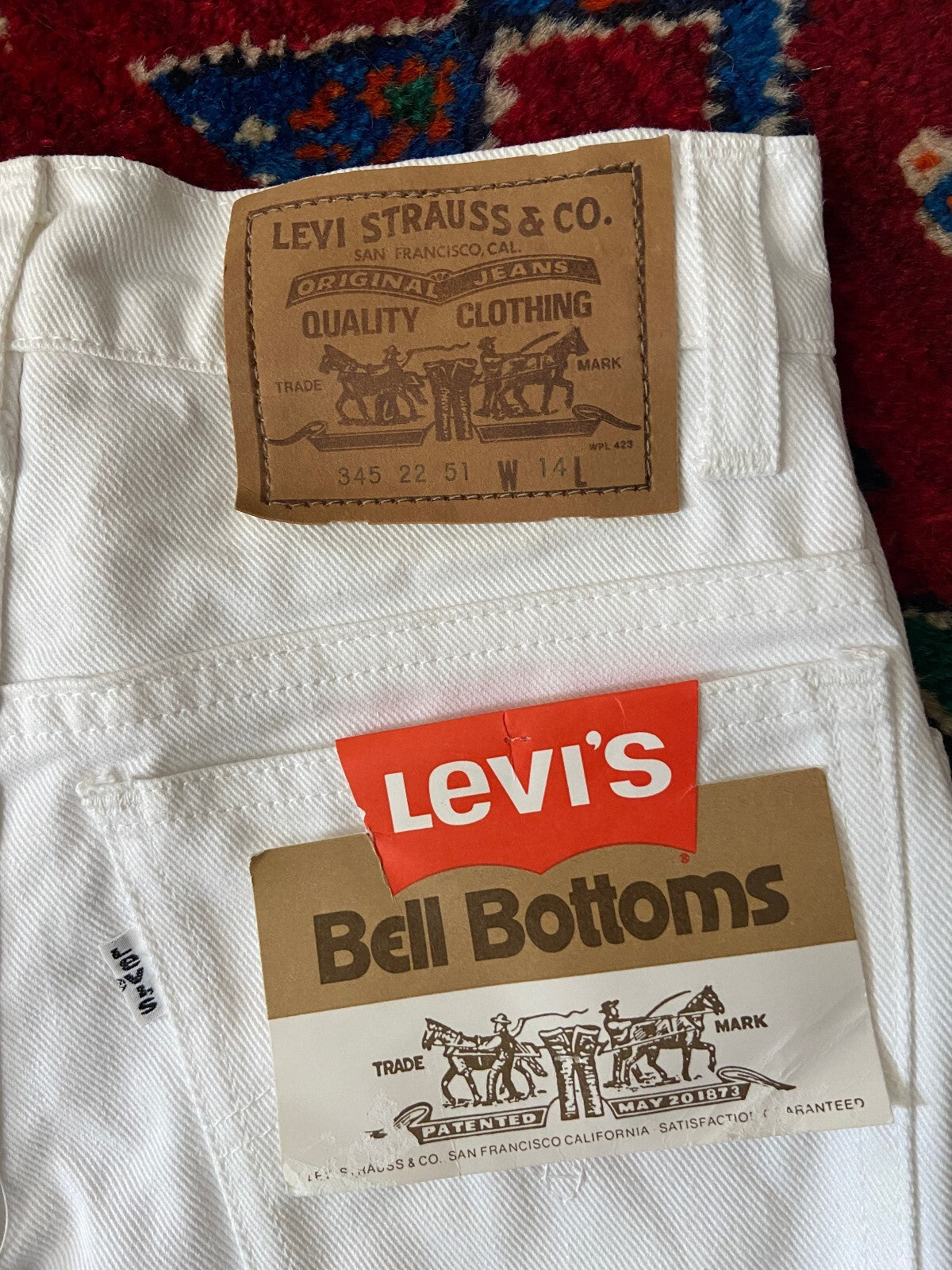 Vintage 1970s Deadstock Levis White Bellbottom Jeans W25
